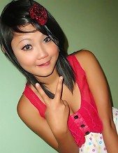Tiny cute Asian teen doing self shot poses and being naughty