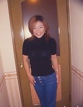 Busty Japanese opens her wet pussy